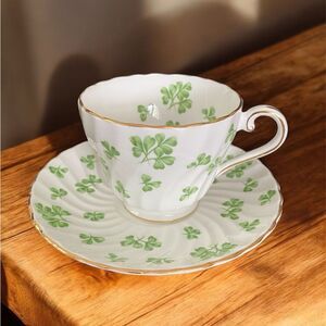 Elegant White and Green Teacup and Saucer Set. Vintage. Aynsley England.